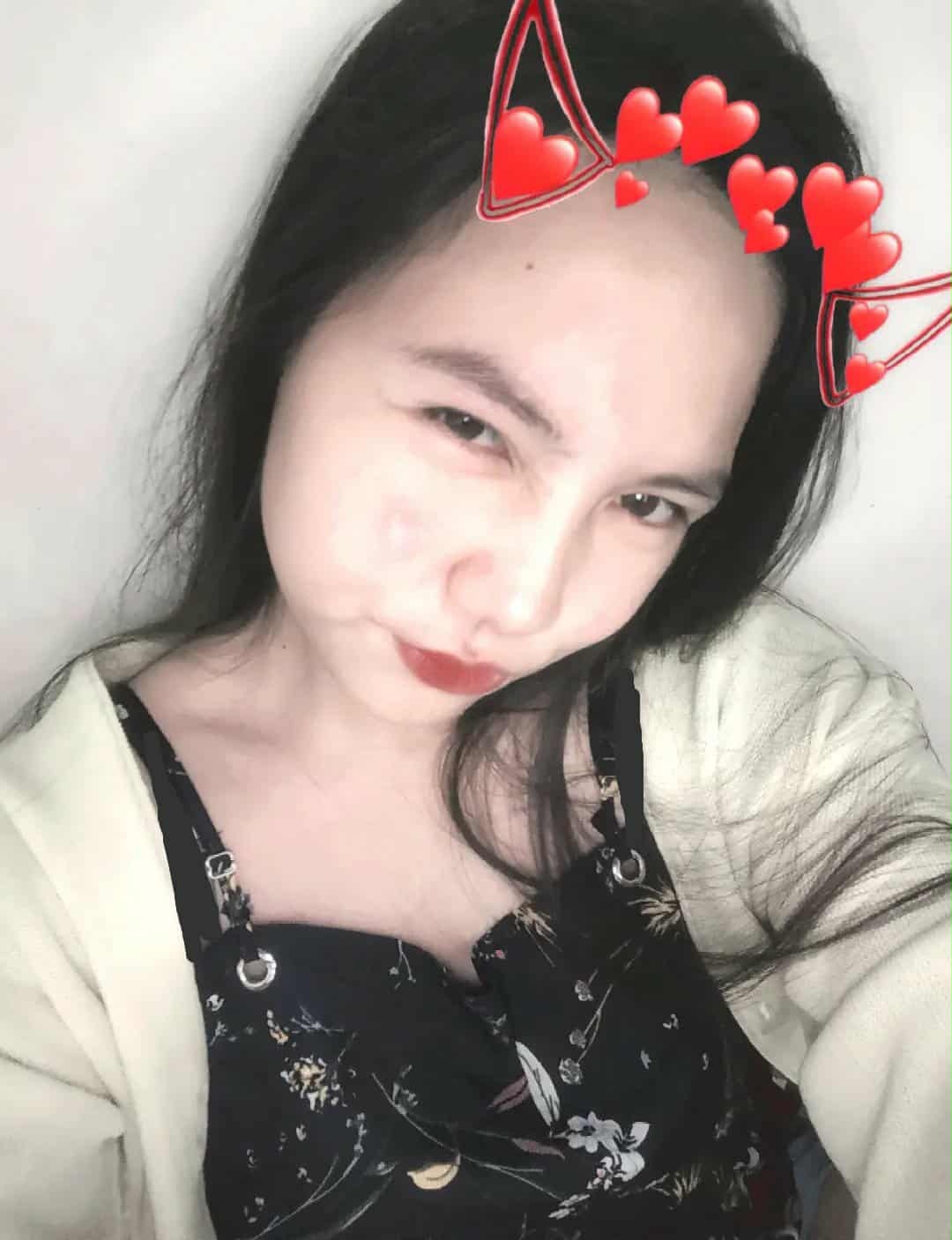 A photo of a person wearing a plaid jacket