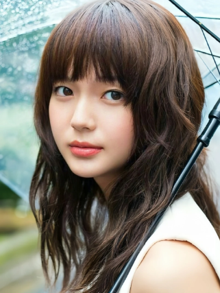 A person wearing a graduation cap and gown